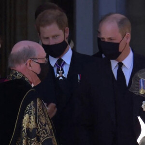 Le prince William, duc de Cambridge, et le prince Harry, duc de Sussex, Sorties des funérailles du prince Philip, duc d'Edimbourg à la chapelle Saint-Georges du château de Windsor, Royaume Uni, le 17 avril 2021. 