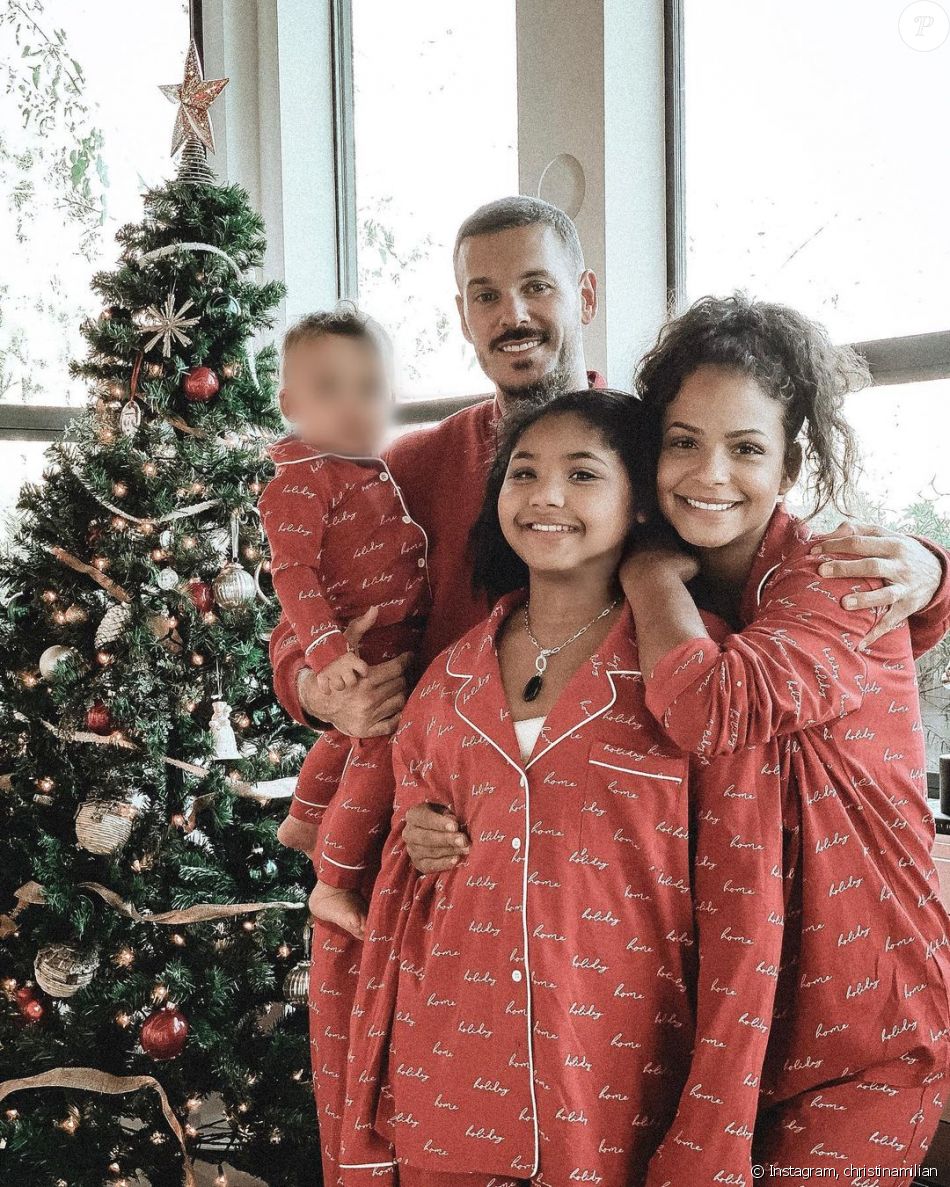 M. Pokora et Christina Milian avec leur fils Isiah et Violet, la fille de Christina, le jour de Noël. Décembre 2020.