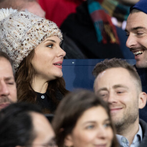 Camille Lacourt et sa compagne Alice Detollenaere (Miss Bourgogne 2010) dans les tribunes lors du match de championnat de Ligue 1 Conforama opposant le Paris Saint-Germain (PSG) aux Girondins de Bordeaux au Parc des Princes à Paris, France, le 23 février 2020. Le PSG a gagné 4-3. © Cyril Moreau/Bestimage