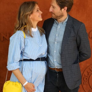 Ophélie Meunier (enceinte) et son mari Mathieu Vergne au village des Internationaux de France de Roland Garros à Paris le 9 juin 2021. © Dominique Jacovides / Bestimage