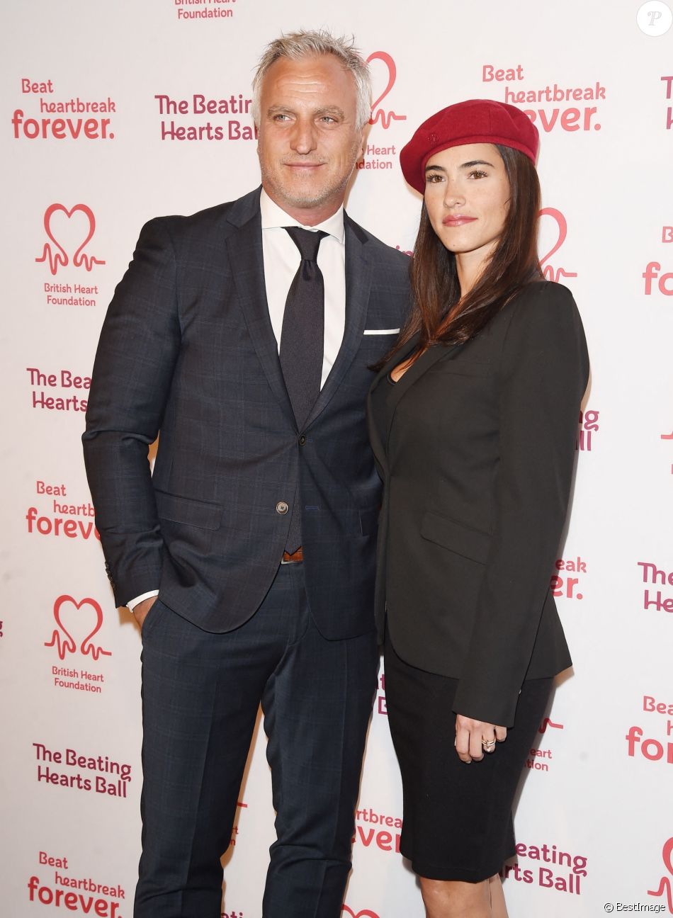 David Ginola et sa compagne Maeva Denat arrivent à la soirée "The Beating Hearts Ball" à Londres, le 27 février 2019.