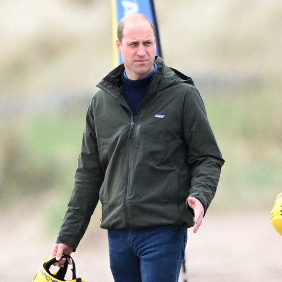 Le prince William, duc de Cambridge, et Catherine Kate Middleton, duchesse de Cambridge, font un tour de char à voile sur la plage Saint Andrews dans le comté de East Lothian en Ecosse le 26 mai 2021.