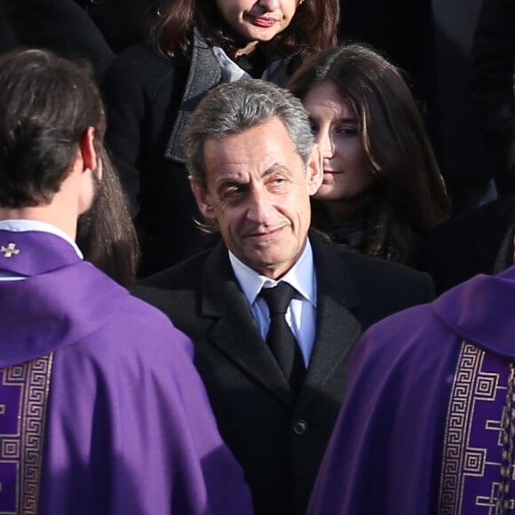 Nicolas Sarkozy, François Sarkozy et sa fille Katinka, Carla Bruni-Sarkozy - Sorties des obsèques de Andrée Sarkozy (mère de N.Sarkozy), dite Dadue née Andrée Mallah, en l'église Saint-Jean-Baptiste à Neuilly-Sur-Seine.