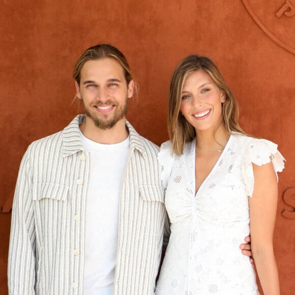 Camille Cerf et son compagnon au village lors des internationaux de France Roland Garros à Paris le 13 juin 2021. © Dominique Jacovides / Bestimage