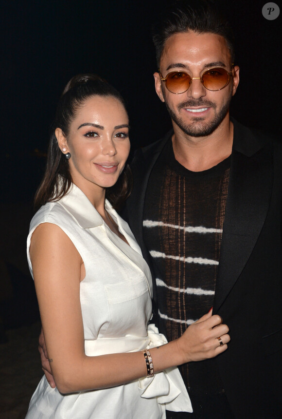 Nabilla Benattia et son mari Thomas Vergara au photocall de l'after party "Magnum x Rita Ora" sur la plage privée Magnum lors du 72ème Festival International du Film de Cannes. © Veeren/Bestimage