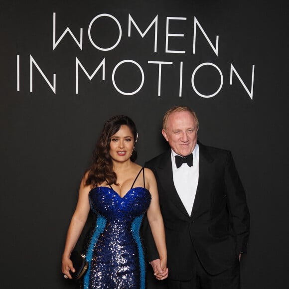 Salma Hayek et son mari François-Henri Pinault au photocall de la soirée Kering "Women In Motion" lors du 74ème Festival International du Film de Cannes, le 11 juillet 2021. © Jacovides-Borde-Moreau/Bestimage