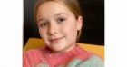 Harper Beckham et son pull signée "Victoria Beckham".