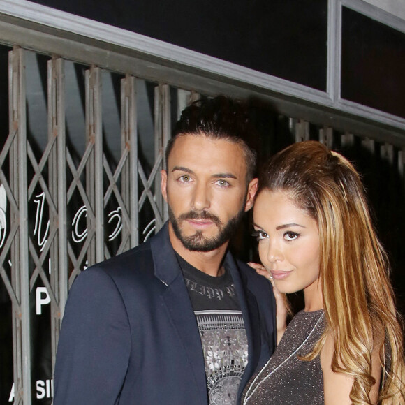 Nabilla Benattia et son petit ami Thomas Vergara à la sortie de la boite de nuit "Cosy Box" à Cannes, le 17 mai 2014. 