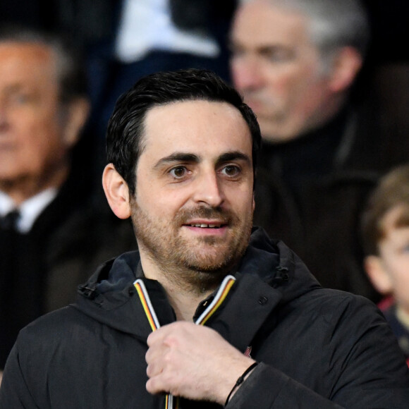 Camille Combal dans les tribunes du parc des Princes lors du match de football de ligue 1, opposant le Paris Saint-Germain (PSG) contre l'Olympique de Marseille (OM) à Paris, France, le 17 mars 2019. Le PSG a gagné 3-1.