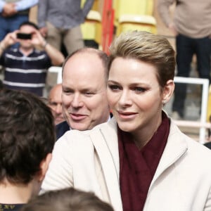 La princesse Charlène de Monaco et son mari le prince Albert II de Monaco - 7ème édition du tournoi de rugby Sainte-Dévote au Stade Louis II à Monaco, le 18 mars 2017. © Dominique Jacovides/Bestimage 