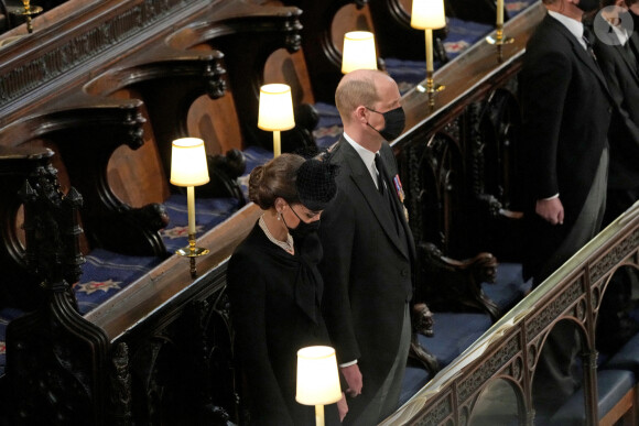 Le prince William, duc de Cambridge, et Catherine (Kate) Middleton, duchesse de Cambridge, - Funérailles du prince Philip, duc d'Edimbourg à la chapelle Saint-Georges du château de Windsor, Royaume Uni, le 17 avril 2021.