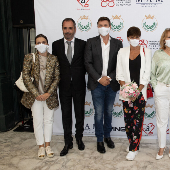 Gareth Wittstock, la princesse Stephanie de Monaco - Le prince Albert II de Monaco participe au 19ème trou de la Princesse de Monaco Cup (Golf) sur la place du Casino de Monte-Carlo le 16 septembre 2021 au profit de la Fondation Princesse Charlène de Monaco et de Fight Aids Monaco. © Olivier Huitel / Pool / Bestimage