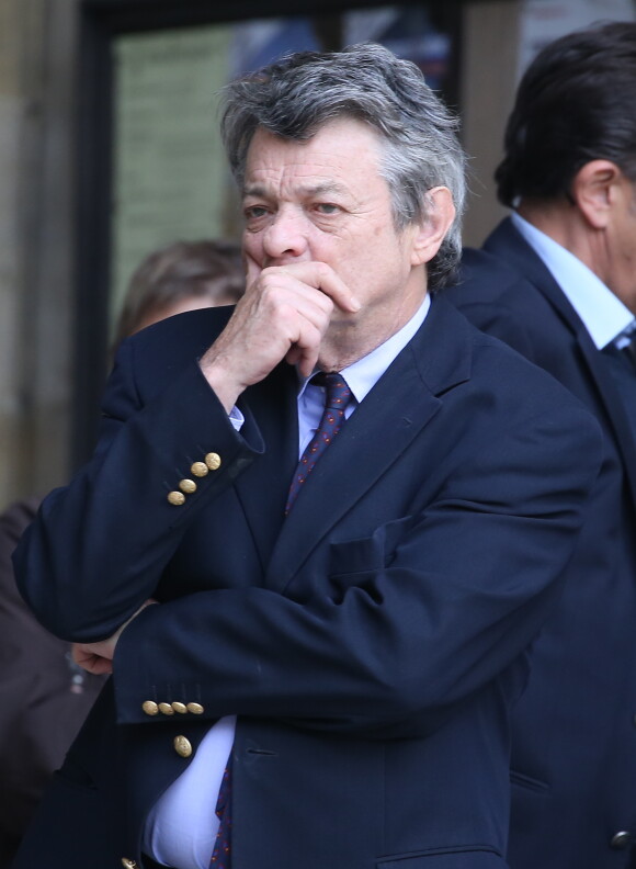 Jean-Louis Borloo à la sortie des obsèques de Patrice Dominguez en la basilique Sainte Clotilde à Paris le 16 avril 2015