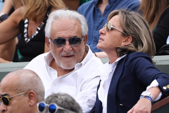 Dominique Strauss-Kahn (DSK) et Myriam L'Aouffir dans les tribunes de Roland-Garros à Paris. Le 30 mai 2017