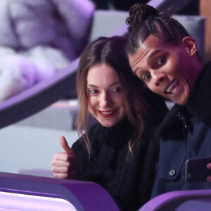 Stromae (nouvelle coupe de cheveux) et sa femme Coralie Barbier au défilé "Victoria's Secret Paris 2016" au Grand Palais à Paris, le 30 novembre 2016. © Cyril Moreau/Bestimage