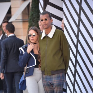 Le chanteur Stromae, se laisse pousser les cheveux, et sa femme Coralie Barbier - People sortant du défilé de mode "Louis Vuitton", collection prêt-à-porter Printemps-Eté 2017 à Paris, le 5 octobre 2016. © CVS/Veeren/Bestimage