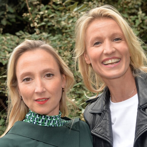 Audrey Lamy et sa soeur Alexandra Lamy - People au défilé Lacoste Collection Prêt-à-Porter Printemps/Eté 2020 lors de la Fashion Week de Paris, le 1er octobre 2019. © Veeren Ramsamy-Christophe Clovis/Bestimage