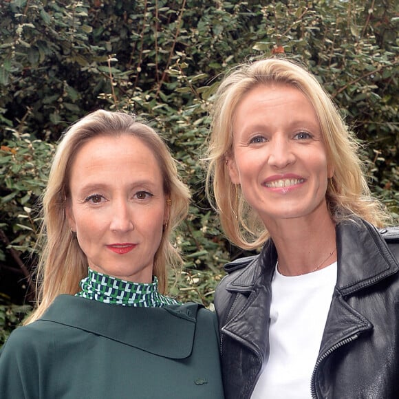 Audrey Lamy et sa soeur Alexandra Lamy - People au défilé Lacoste Collection Prêt-à-Porter Printemps/Eté 2020 lors de la Fashion Week de Paris, le 1er octobre 2019. © Veeren Ramsamy-Christophe Clovis/Bestimage