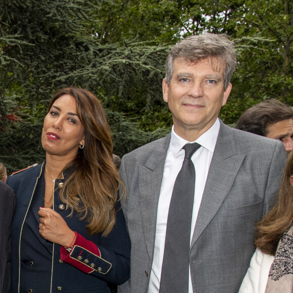 Arnaud Montebourg et Amina Walter en backstage lors de l'évènement "Le Concert de Paris" depuis le Champ-de-Mars à l'occasion de la Fête Nationale du 14 Juillet 2021.