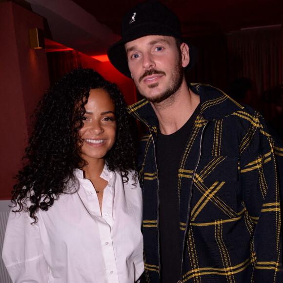 Matt Pokora et sa femme Christina Milian lors de la soirée d'anniversaire de Cindy Bruna au restaurant Giusé Trattoria à Paris. Le 1er octobre 2021. © Rachid Bellak/Bestimage 