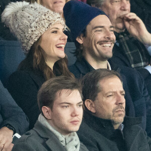 Camille Lacourt et sa compagne Alice Detollenaere (Miss Bourgogne 2010) dans les tribunes lors du match de championnat de Ligue 1 Conforama opposant le Paris Saint-Germain (PSG) aux Girondins de Bordeaux au Parc des Princes à Paris, France, le 23 février 2020. Le PSG a gagné 4-3. © Cyril Moreau/Bestimage