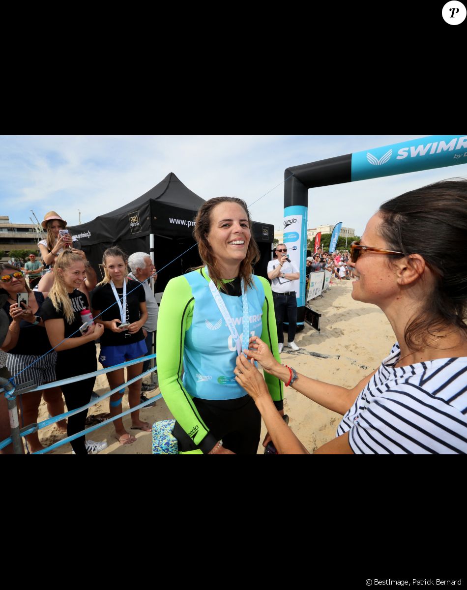 Exclusif - Laure Manaudou - La championne de natation L.Manaudou organise et lance la 1er édition de sa course, la "Swimrun" à Arcachon, France, le 23 juin 2019. Maintenant organisatrice de course avec son amie C.Gauzet, ancienne candidate de l'émission Koh-Lanta. Cette première édition de course et de nage était composée de 12 kilomètres de course dans le sable et 3 kilomètres de nage en mer. © Patrick Bernard/Bestimage
