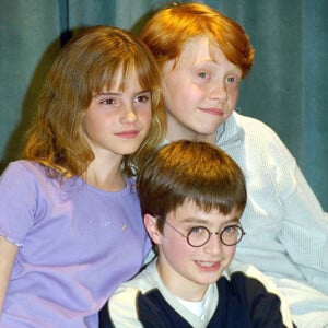 Emma Watson, Daniel Radcliffe et Rupert Grint - Conférence de presse pour le film "Harry Potter à l'école des sorciers" à Londres.