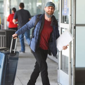 Exclusif - Daniel Radcliffe arrive à l'aéroport JFK à New York le 14 octobre 2021.