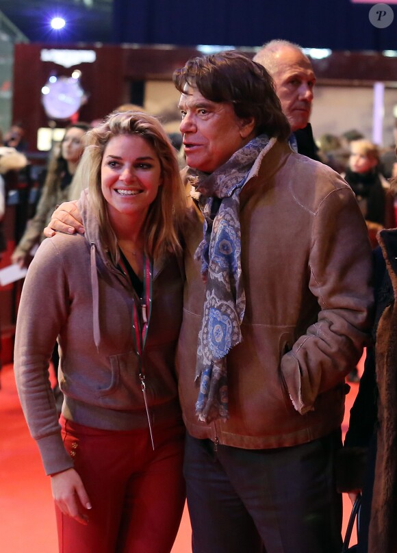 Bernard Tapie et sa fille Sophie - Dans le cadre du Gucci Paris Masters a eu lieu l'epreuve "Style & Competition for AMADE" à Villepinte, le 7 décembre 2013.