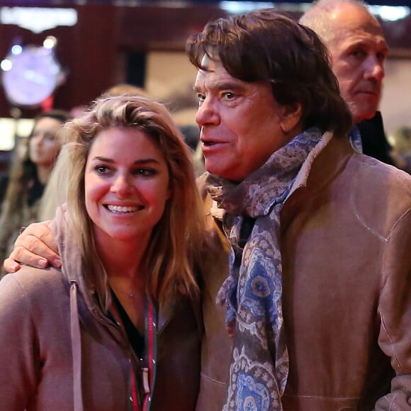 Bernard Tapie et sa fille Sophie - Dans le cadre du Gucci Paris Masters a eu lieu l'epreuve "Style & Competition for AMADE" à Villepinte, le 7 décembre 2013.