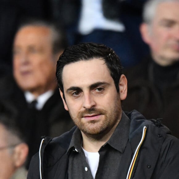 Camille Combal dans les tribunes du parc des Princes lors du match de football de ligue 1, opposant le Paris Saint-Germain (PSG) contre l'Olympique de Marseille (OM) à Paris, France, le 17 mars 2019. Le PSG a gagné 3-1.