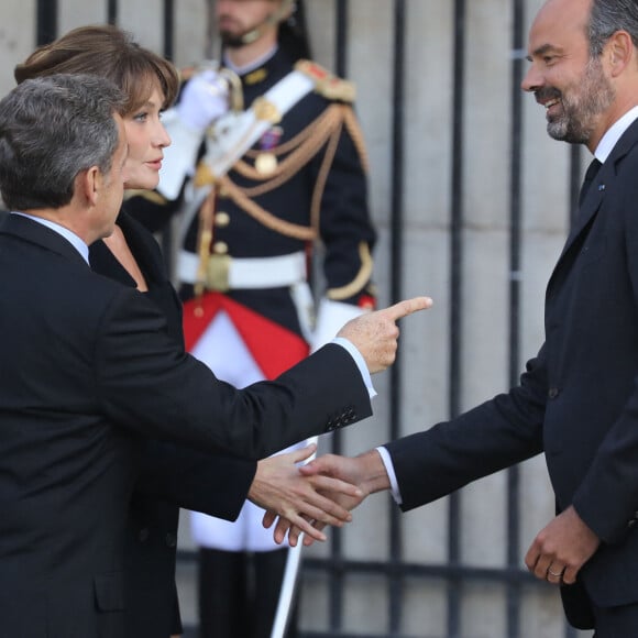 Nicolas Sarkozy et sa femme Carla Bruni, Edouard Philippe - Arrivées en l'église Saint-Sulpice pour les obsèques de l'ancien président de la République Jacques Chirac à Paris. Un service solennel sera présidé par le président de la République. Le 30 septembre 2019