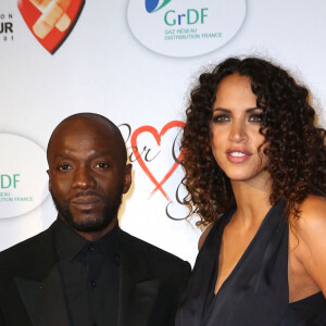 Claude Makelele et Noémie Lenoir - Personnalités au gala "Par Coeur" pour les 10 ans de l'association "Cekedubonheur" au pavillon d'Armenonville à Paris. Le 24 septembre 2015