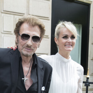Johnny Hallyday et sa femme Laeticia Hallyday - People au défilé de mode Haute-Couture automne-hiver 2016/2017 "Christian Dior" à Paris. Le 4 juillet 2016 © Olivier Borde / Bestimage