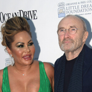 Phil Collins et son ex-femme Orianne au photocall du 4ème gala de la fondation Little Dreams à Miami le 15 novembre 2018.