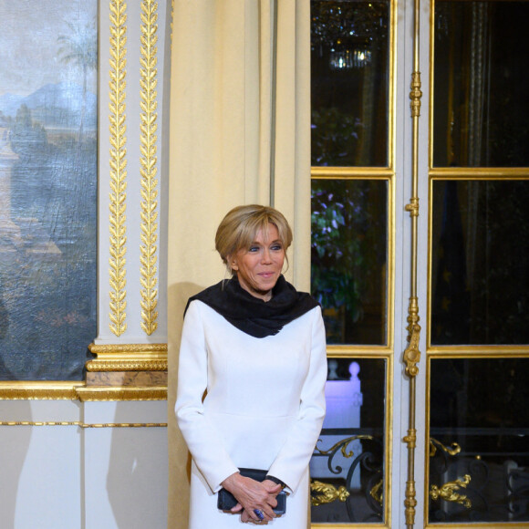 Emmanuel Macron, president de la République francaise, sa femme Brigitte Macron - Dîner des chefs d'Etats et de Gouvernements, des chefs des Organisations internationales, des acteurs du numérique ainsi que des partenaires du Forum au palais de l'Elysée à Paris. Le 11 novembre 2021