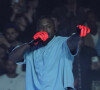 Kanye West sur scène pour le concert caritatif "Free Larry Hoover" au Memorial Coliseum de Los Angeles, le 9 décembre 2021.
