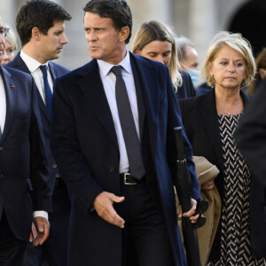 L'ancien premier ministre, Manuel Valls et l'ancien président François Hollande lors de l'hommage national au soldat Maxime Blasco à l'hôtel des Invalides, à Paris, France, le 29 septembre 2021.