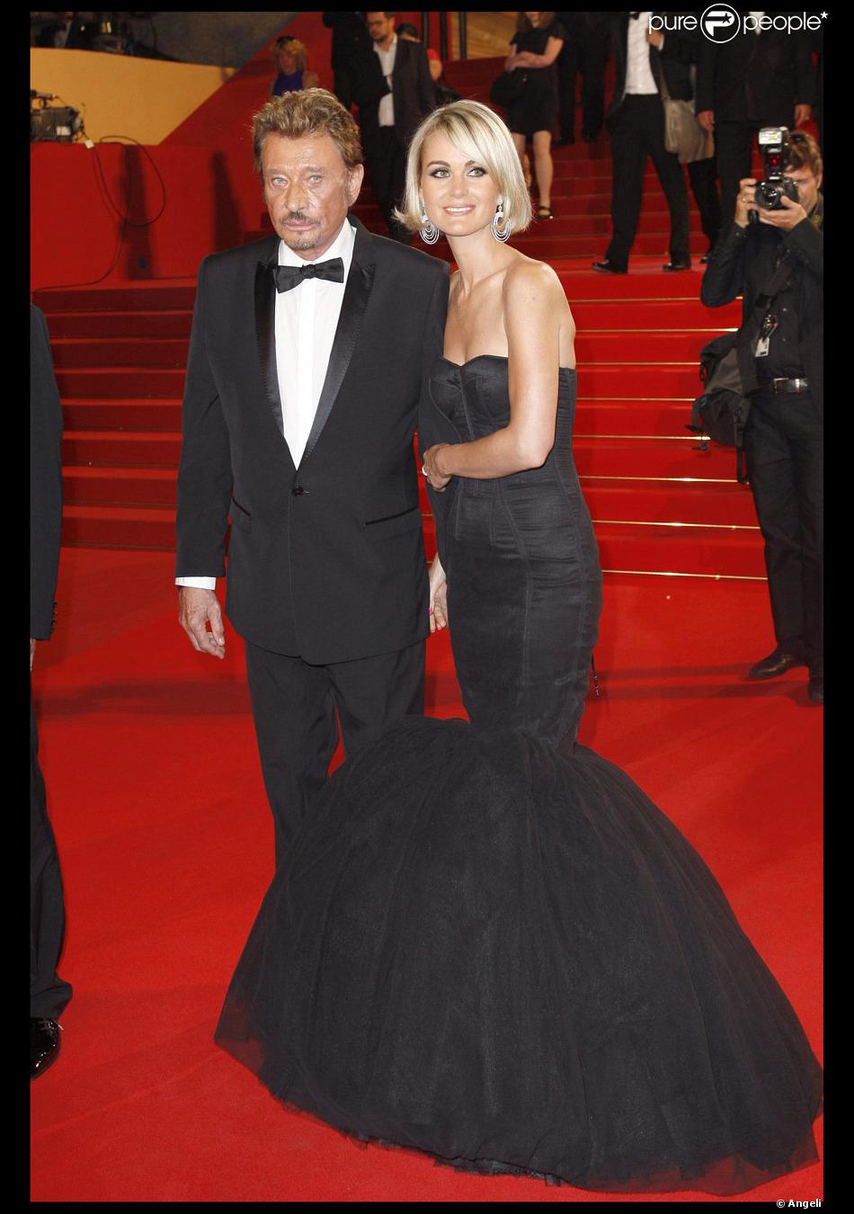Johnny Hallyday Presente A Cannes Le Film Vengeance Au Cote De Laeticia En Mai 2009 Purepeople