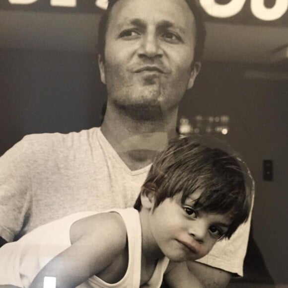 Arthur avec son fils aîné Samuel, enfant.