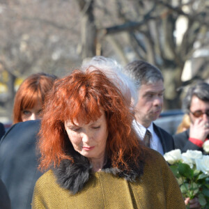 Sabine Azéma - Obsèques d'Alain Resnais au cimetière du Montparnasse à Paris le 10 mars 2014. 