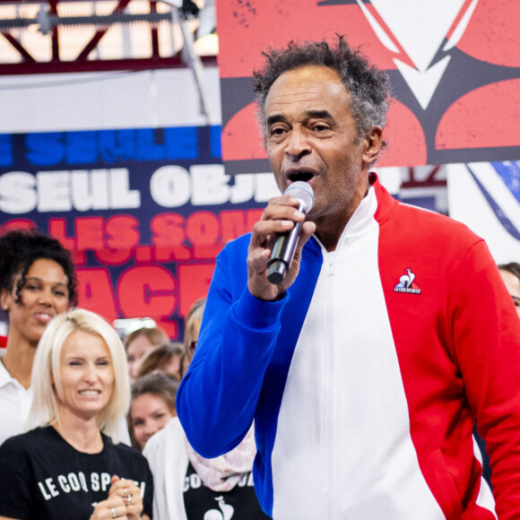 Yannick Noah et Soprano lors du défilé de la collection Olympique de l'équipementier "Le Coq Sportif" à Romilly-sur-Seine, France, le 4 octobre 2021. © Jean-Baptiste Autissier/Panoramic/Bestimage