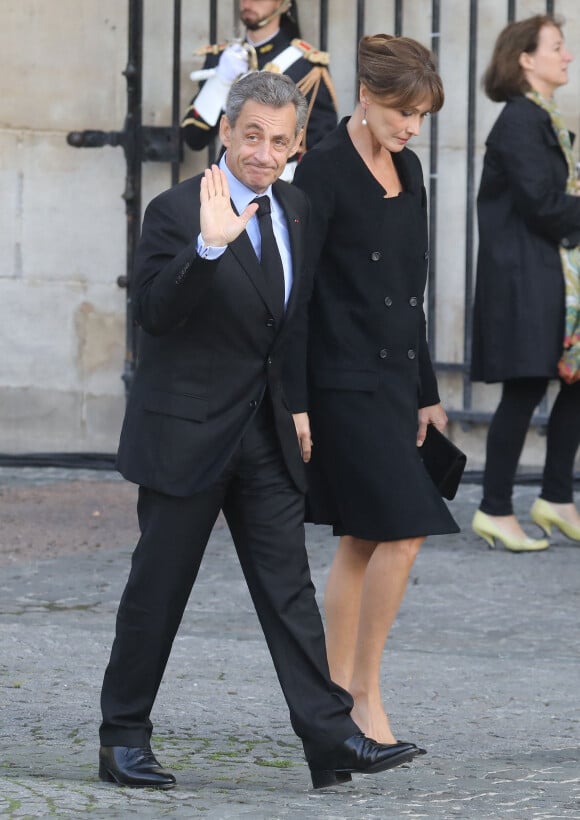 Nicolas Sarkozy et sa femme Carla Bruni - Arrivées en l'église Saint-Sulpice pour les obsèques de l'ancien président de la République Jacques Chirac à Paris © Dominique Jacovides / Bestimage 