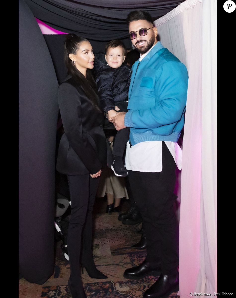 Exclusif - Nabilla Benattia, son mari Thomas Vergara et leur fils Milann - Nabilla Benattia, son mari Thomas Vergara et leur fils Milann posent lors de l'avant première du documentaire "Nabilla sans filtre" (Amazon Prime Vidéo) à Paris le 22 Novembre 2021.© Jack Tribeca / Bestimage