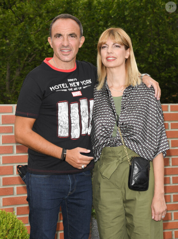 Nikos Aliagas avec sa femme Tina Grigoriou - Photocall à l'occasion de l'inauguration du nouveau Disney's Hotel New York - The Art of Marvel à Disneyland Paris le 26 juin 2021. © Guirec Coadic / Bestimage