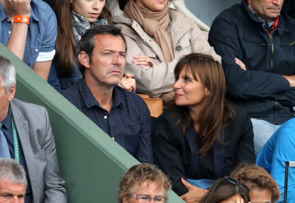 Jean-Luc Reichmann et sa compagne Nathalie aux Internationaux de France de tennis de Roland Garros à Paris le 1er juin 2014. 