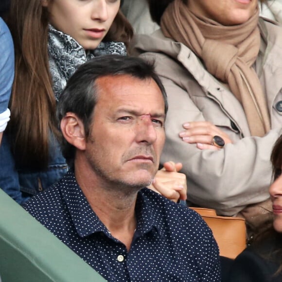 Jean-Luc Reichmann et sa compagne Nathalie aux Internationaux de France de tennis de Roland Garros à Paris le 1er juin 2014. 