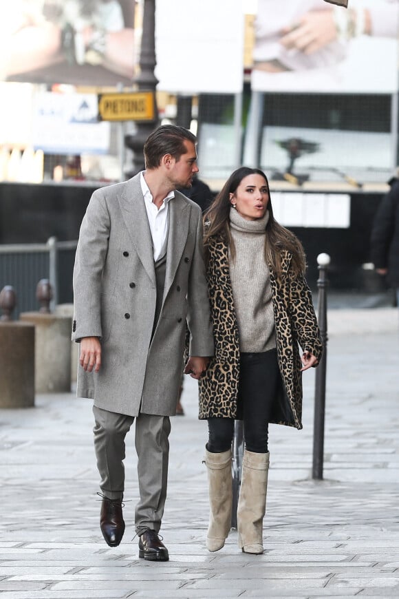 Exclusif - Capucine Anav et son compagnon Victor sont allés choisir leurs alliances pour leur futur mariage, à la bijouterie Galeries Lafayette - Royal Quartz Paris rue Royal à Paris, France, le 7 février 2022.