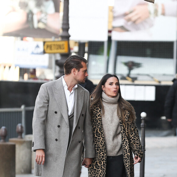 Exclusif - Capucine Anav et son compagnon Victor sont allés choisir leurs alliances pour leur futur mariage, à la bijouterie Galeries Lafayette - Royal Quartz Paris rue Royal à Paris, France, le 7 février 2022.