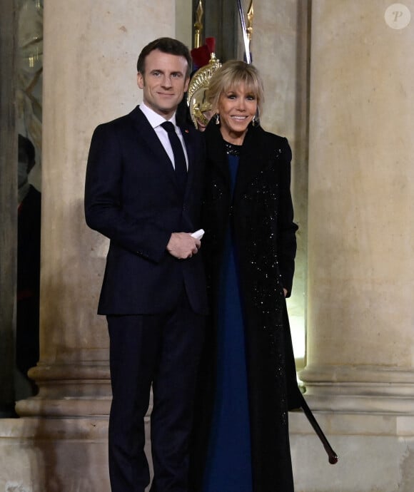Le président Emmanuel Macron et Brigitte Macron au palais de l'Elysée à Paris © Federico Pestellini / Panoramic / Bestimage 